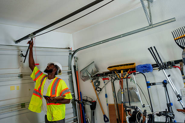Professional Garage Door Spring Repair technician working in Maywood Park, OR